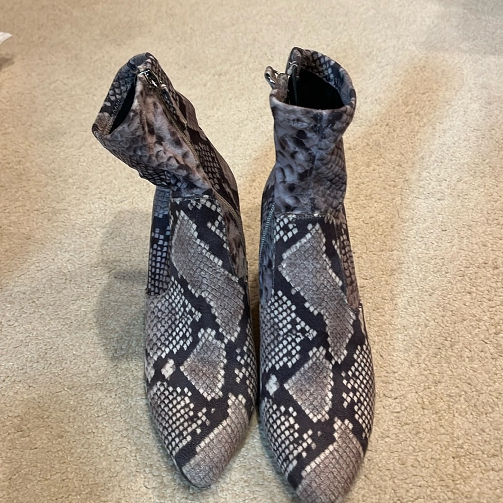 Snakeskin heeled boot